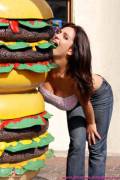 Denise eating a giant burger