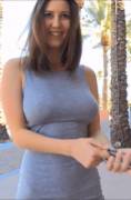 braless boobs moving freely under her tight dress