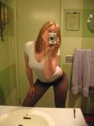 Blonde takes a selfie in her pantyhose