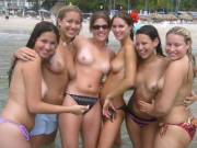 Where exactly can I find a beach with topless chicks like these six?