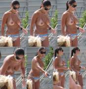 Latina MILF beach club, topless.