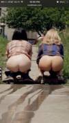 June Diane Raphael and Casey Wilson showing their asses.