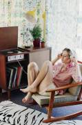 Vintage girl listening to vinyl records