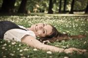 Laying in a field